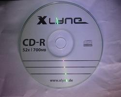 CD-ROM Xlyne Front Audio White Background.JPG